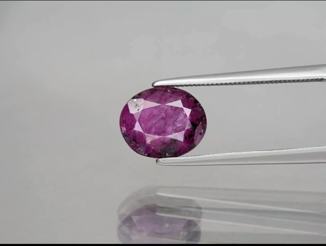 3.40ct 9.7x8mm Oval Purplish Red Ruby Unheated Africa