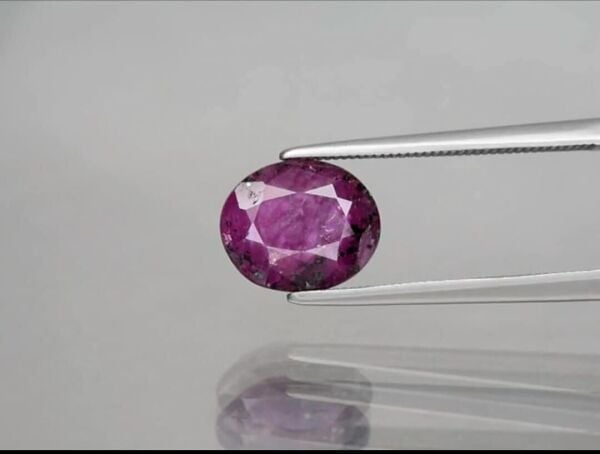 3.40ct 9.7x8mm Oval Purplish Red Ruby Unheated Africa