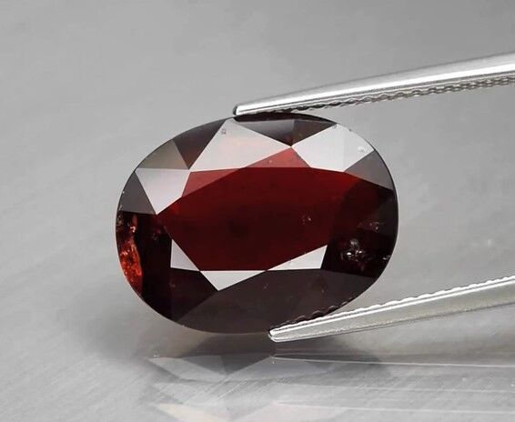 7.99ct 14.8x11.4mm Oval Natural Deep Orange Garnet,Madagascar