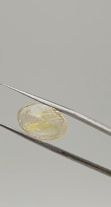 7.35ct 14x9.3mm Oval Natural Golden Rutilated Quartz