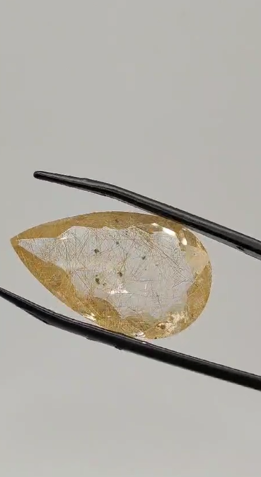 23.55ct 28.3x16.7mm Pear Natural Golden Rutilated Quartz Faceted