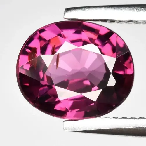 1.12ct 6.7 x 5.7mm VS Oval Natural Purplish Pink Rhodolite Garnet - Tanzania