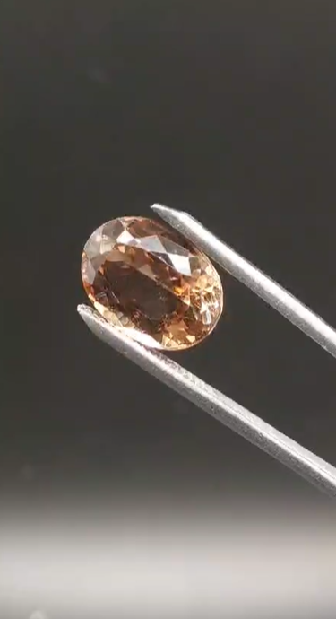 10.30ct 15x11.2mm Oval Natural Champagne Topaz Brazil