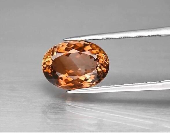 7.41ct 13.3x9.7mm VVS Oval Natural Champagne Topaz Brazil