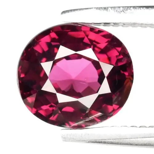 1.21ct 6.2x5.5mm VS Oval Natural Purplish Pink Rhodolite Garnet - Africa Gem