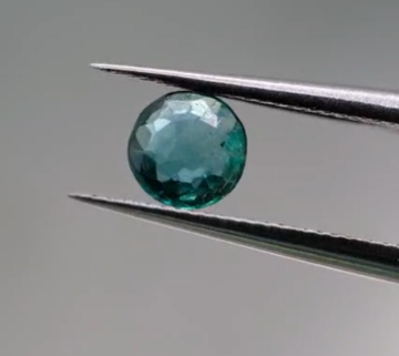0.70ct 5.7mm Round Natural Emerald , Zambia
