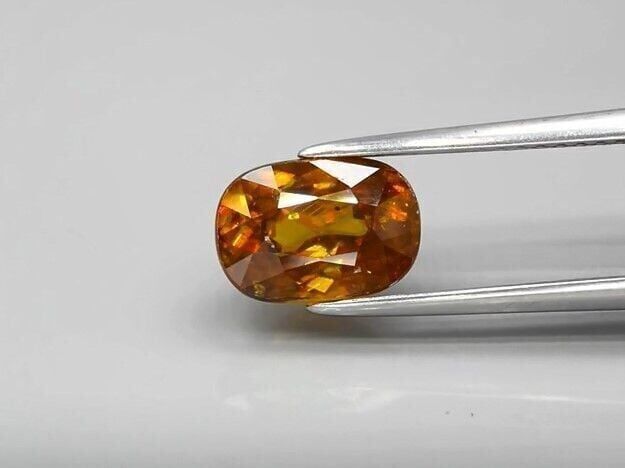 2.35ct 8.8x6.2mm Oval Natural Greenish Yellow Sphene, Adamantine Luster