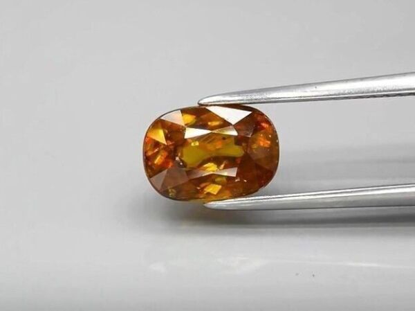 2.35ct 8.8x6.2mm Oval Natural Greenish Yellow Sphene, Adamantine Luster