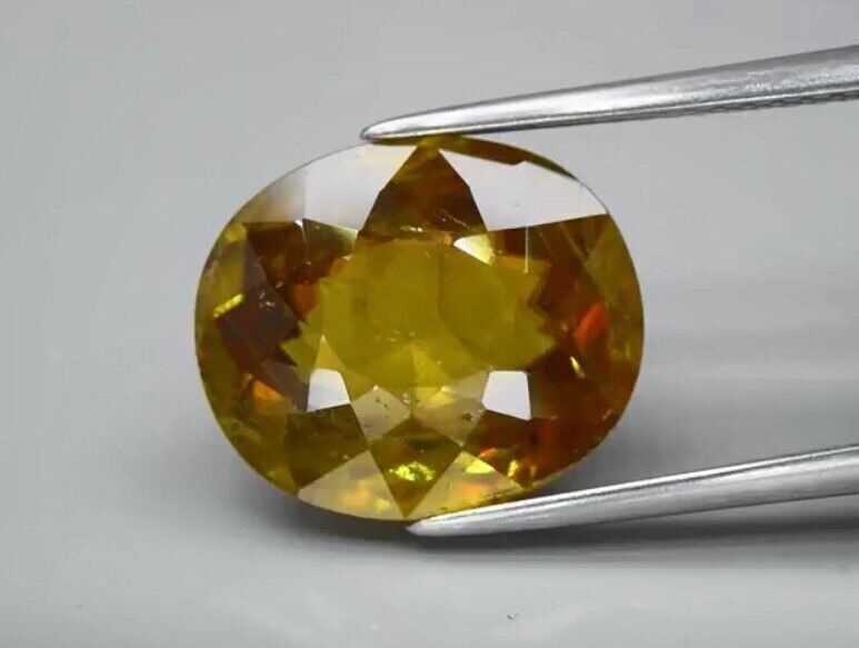 6.39ct 13x11mm Oval Natural Greenish Yellow Sphene Madagascar, Amazing Luster