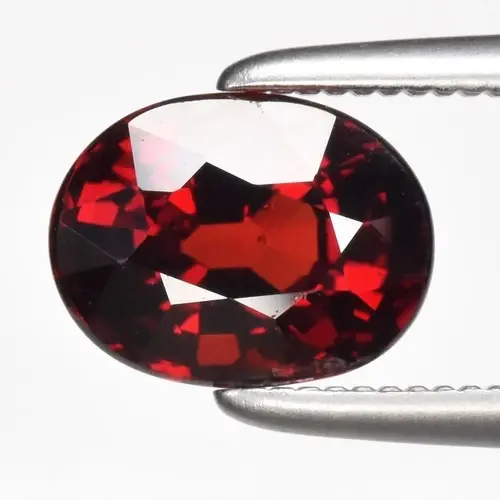 1.49ct 7x5.5mm VS Oval Natural Reddish Orange Garnet - Africa