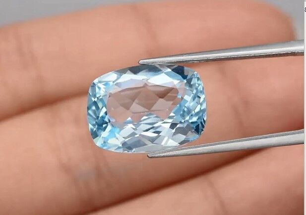 9.14ct 14.3x10.6mm VVS Cushion Natural Sky Blue Topaz