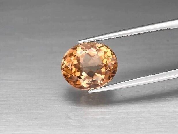 6.91ct 12x10mm VVS Oval Natural Champagne Topaz, Brazil