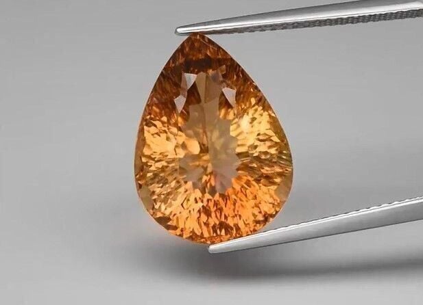 12.86ct 16.5x12.3mm VVS Pear Concave Natural Champagne Topaz Brazil