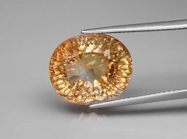 15.42ct 15.5x12.7mm VVS Oval Concave Natural Champagne Topaz Brazil