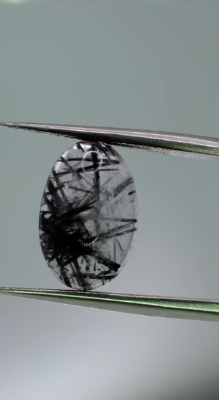 3.85ct 13.3x8.8mm Oval Natural Black Rutilated Quartz