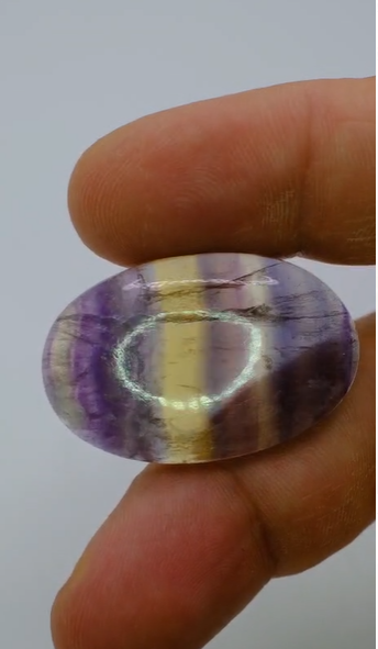 56.70ct 36.2x23.9mm Oval Cabachon Natural Multi-Color Fluorite