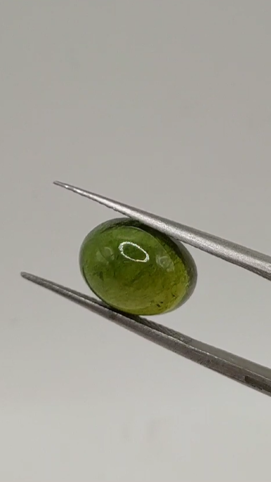 5.10ct 11.4x8.8mm Oval Cab. Natural Green Tourmaline