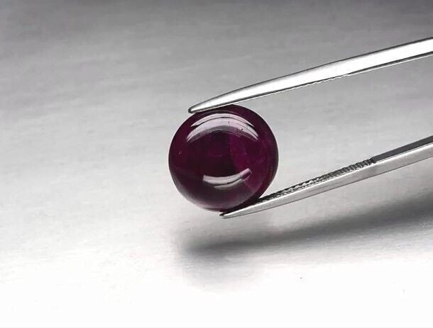 10.95ct Semi-Round Cabochon Purplish Red Ruby Tanzania *Heated