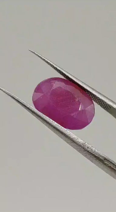 6.55ct 12.6x9mm Oval Natural Ruby ( Heated Glass Filling)