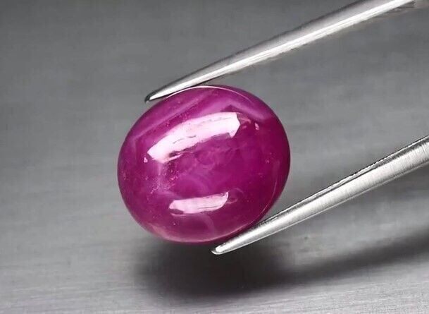 6.37ct 11.5x10mm Oval Cabochon Purplish Red Ruby Africa *Heated