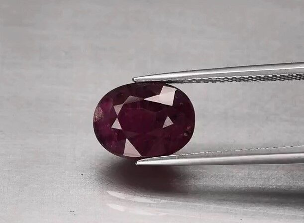 4.87ct 10.7x8.2mm Oval Purplish Red Ruby Tanzania *Heated