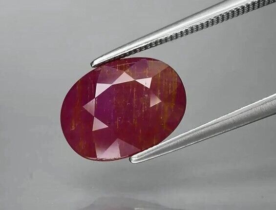 4.87ct 11.7x9mm Oval Unheated Purplish Red Ruby, Tanzania