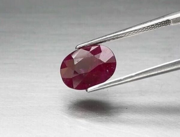 4.08ct 11.2x8.7mm Oval Purplish Red Ruby Tanzania *Heated