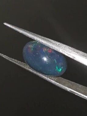 2.85ct 13.8x9.8mm Oval Natural Ethiopian Opal