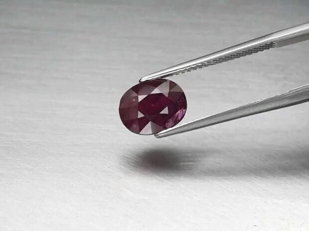 3.37ct 9.5x7.5mm Oval Purplish Red Ruby Mozambique *Heated