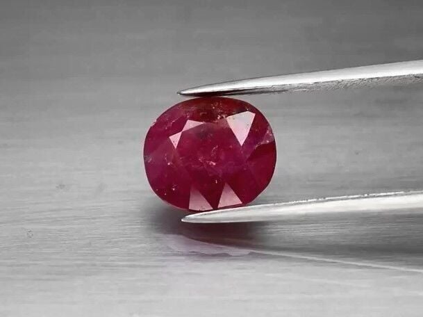 3.06ct 9x8.4mm Oval Purplish Red Ruby Unheated Tanzania