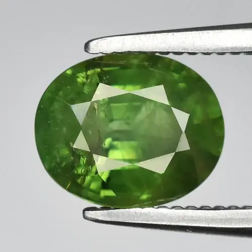 1.22ct 6.7x5.5mm Oval Natural Green Sapphire - Heated, Africa