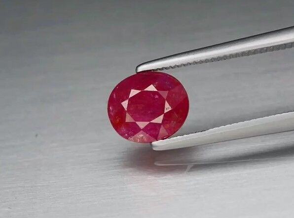 1.28ct 6.5x5.5mm Oval Purplish Red Ruby Unheated Tanzania