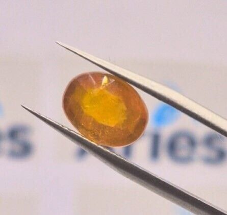5.26ct 10.7x8.1mm Oval Natural Yellow Sapphire ( Glass Filling)