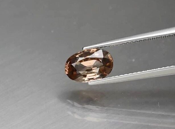 2.63ct 9.5x6.2mm VS Oval Natural Champagne Zircon Gentle Heat Vietnam