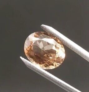6.80ct 13.4x10.8mm Oval Champagne Topaz Brazil