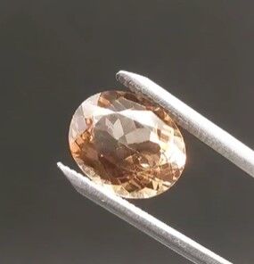6.80ct 13.4x10.8mm Oval Champagne Topaz Brazil