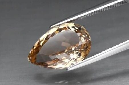 7.79ct 15x10.2mm VVS Pear Natural Champagne Topaz, Brazil