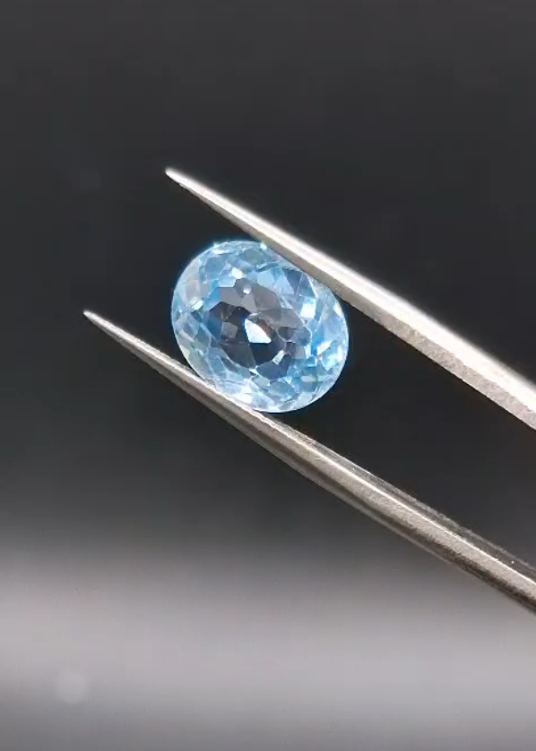 4.86ct 11x9mm Oval Natural Swiss Blue Topaz