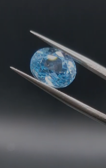 5.73ct 11x9.1mm Oval Natural Swiss Blue Topaz