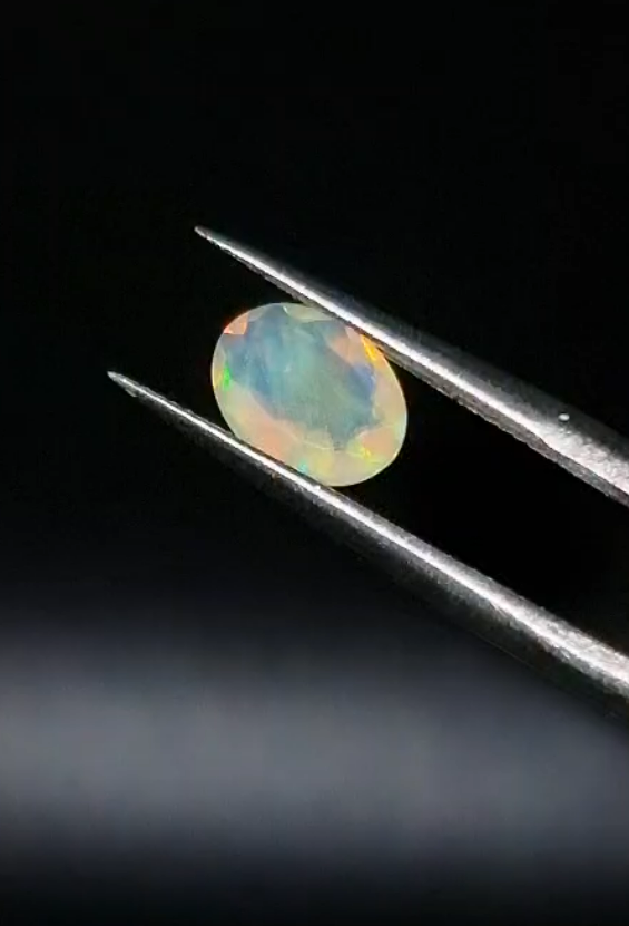 0.65ct  7.9x6.1mm Oval Natural Faceted Ethiopian Opal