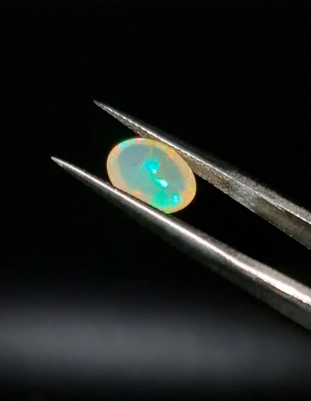 1.22ct  9x6.8mm Oval Natural Cabachon Ethiopian Opal