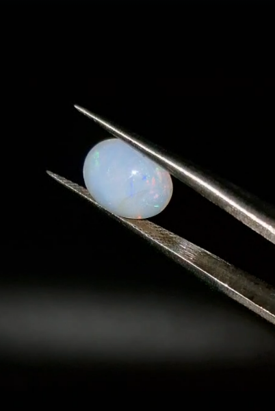 1.74ct  9.9x7.9mm Oval Natural Cabachon Ethiopian Opal