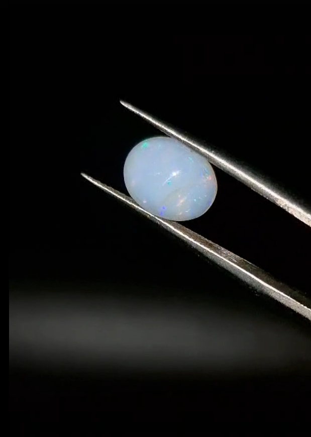 1.74ct  9.9x7.9mm Oval Natural Cabachon Ethiopian Opal