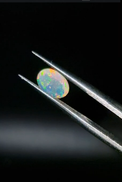 0.58ct  7.8x5.7mm Oval Natural Faceted Ethiopian Opal