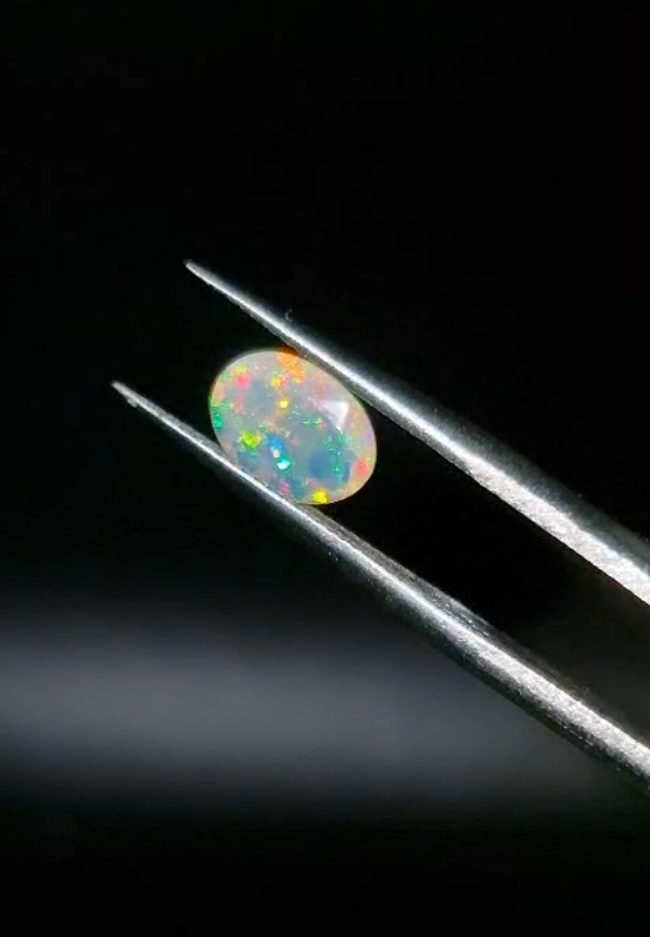 0.58ct  7.8x5.7mm Oval Natural Faceted Ethiopian Opal