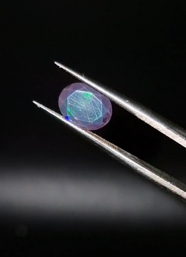 0.98ct 9x7.1mm Oval Natural Faceted Ethiopian Opal