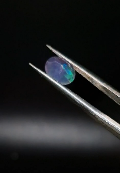 0.98ct 9x7.1mm Oval Natural Faceted Ethiopian Opal