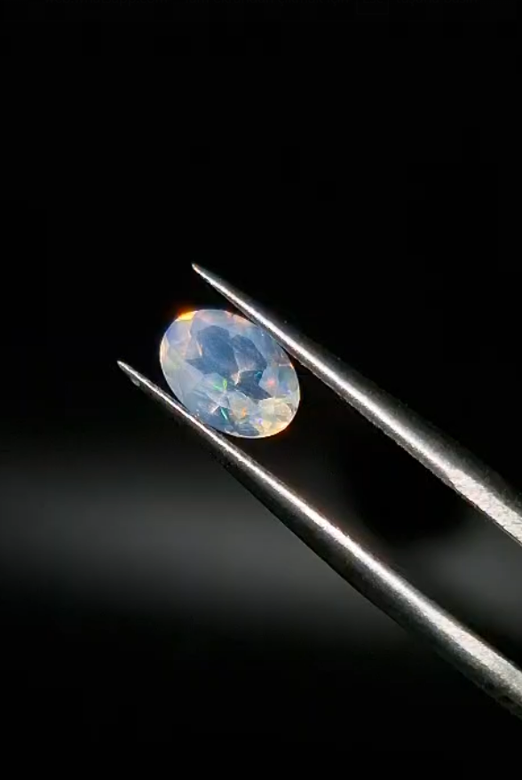 0.60ct  7.1x5.1mm Oval Natural Faceted Ethiopian Opal