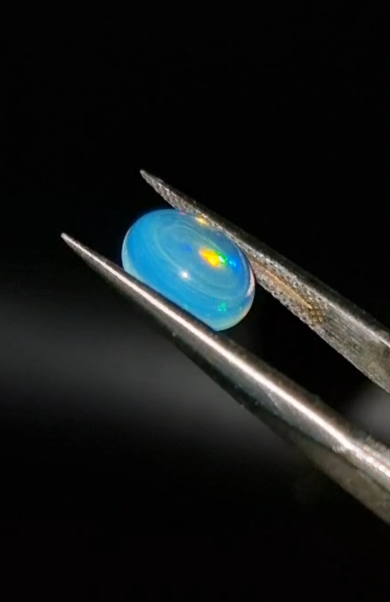 1.13ct 9.1x7mm Oval Natural Cabachon Ethiopian Opal
