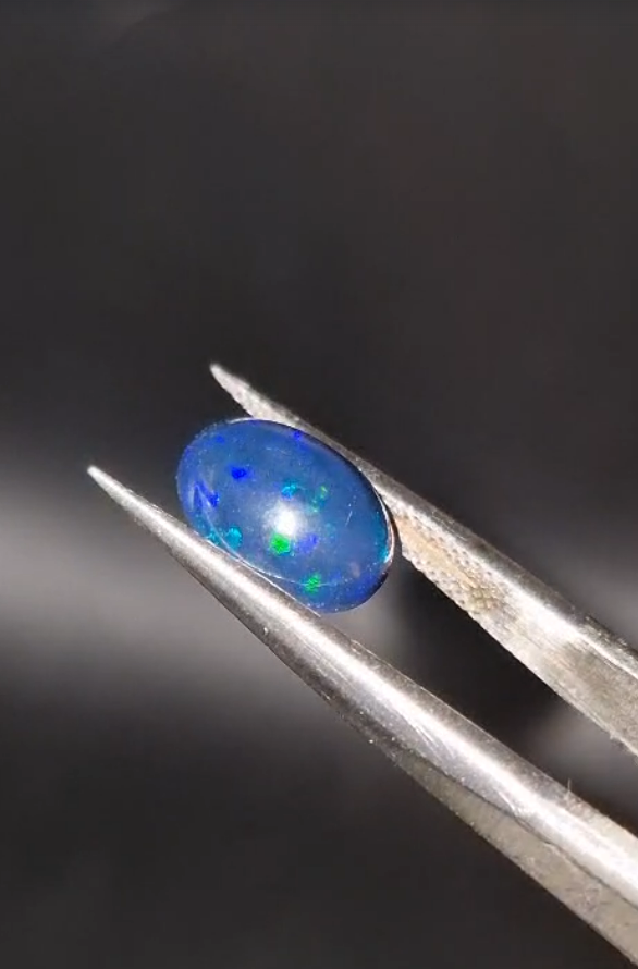 1.40ct 9.9x7.4mm Oval Natural Cabachon Ethiopian Opal